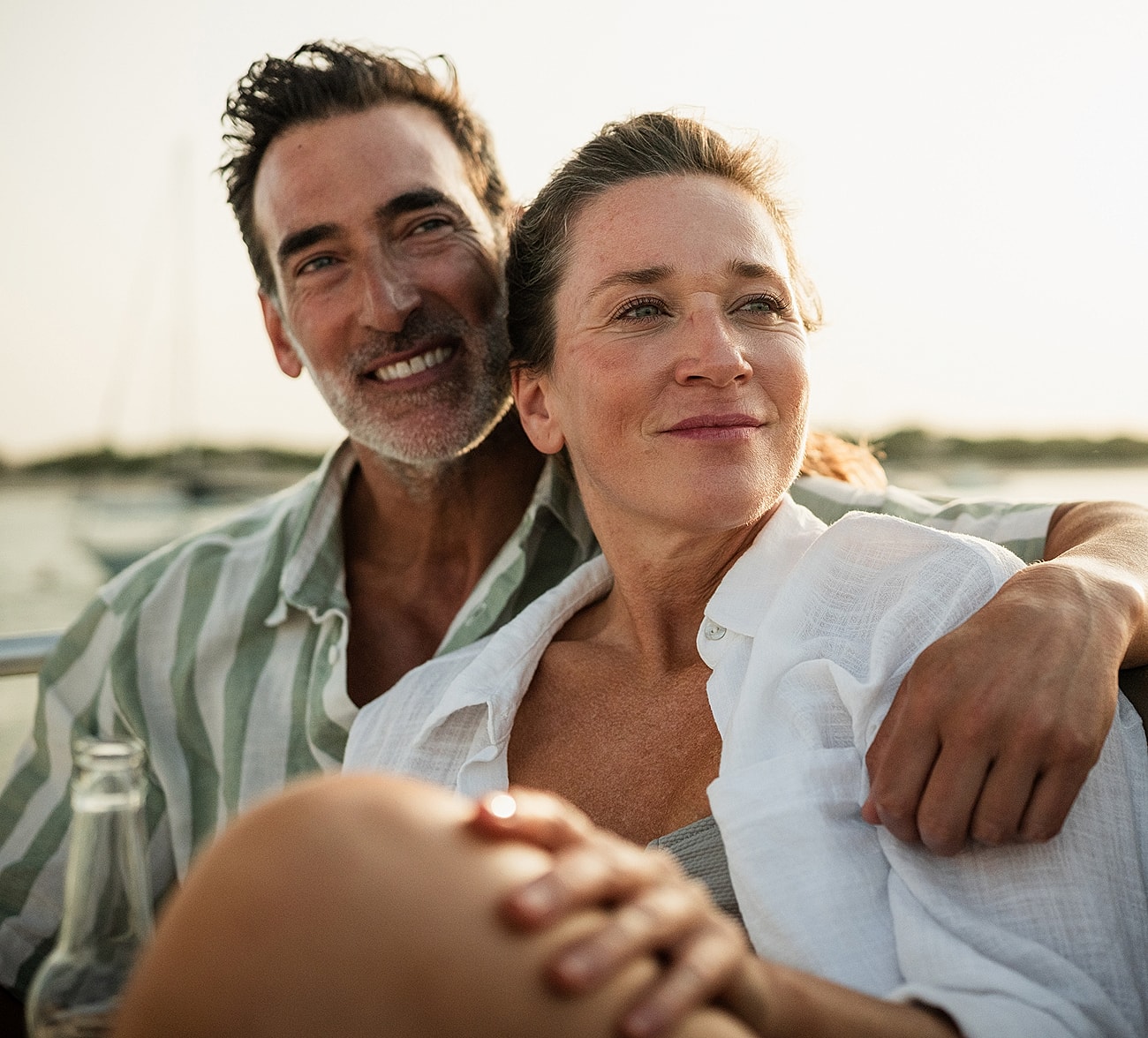 Couple enjoying time together on a boat.