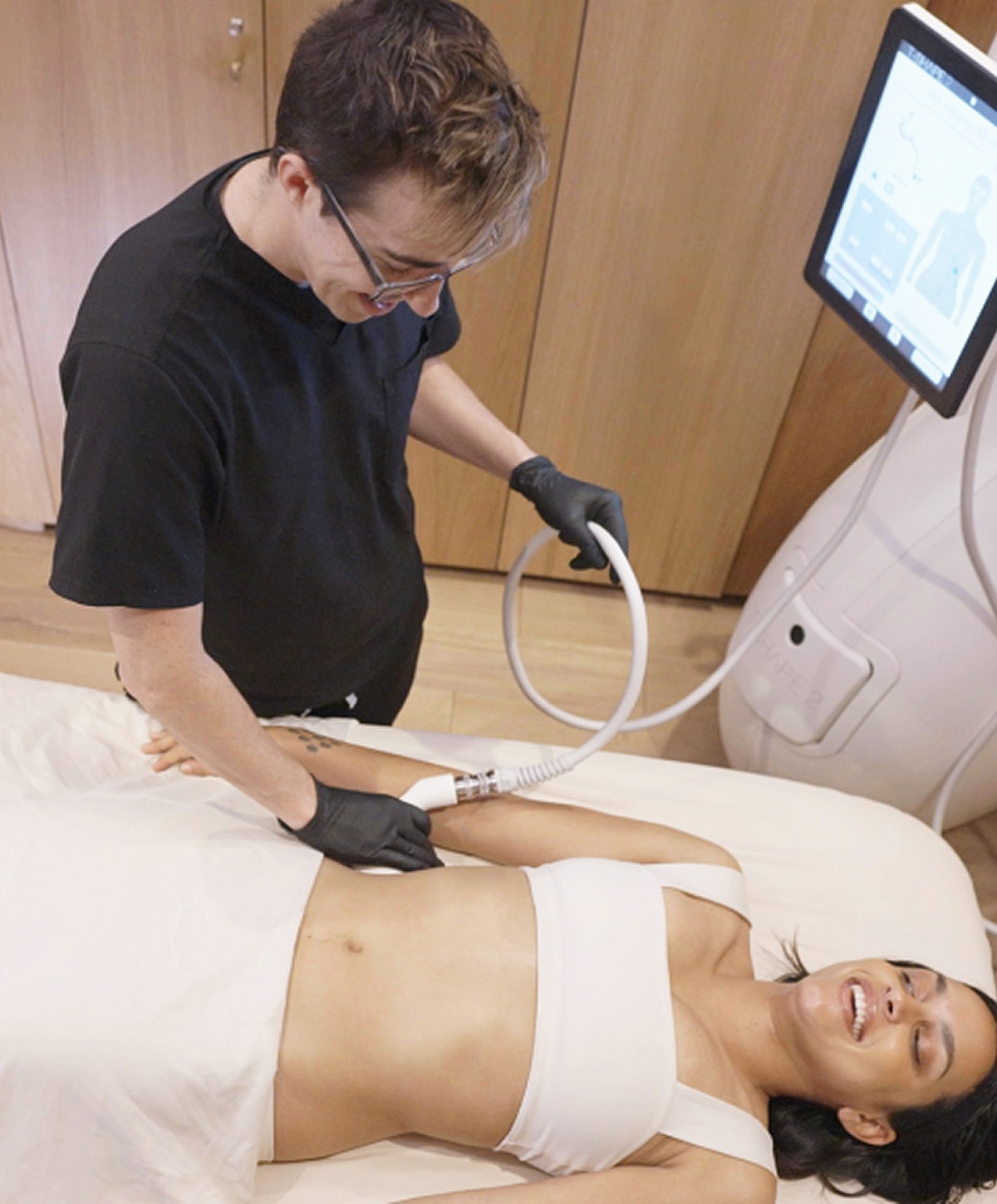 Aesthetic treatment session in clinical setting.